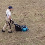 Scarifying lawn with a scarifier